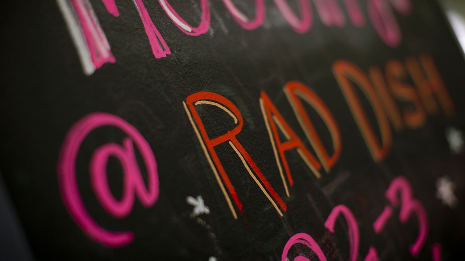 A chalkboard sign at Rad Dish Co-Op.