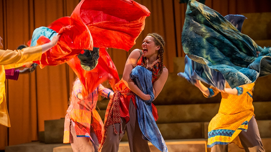 An actor on stage during a dress rehearsal of The Odyssey.