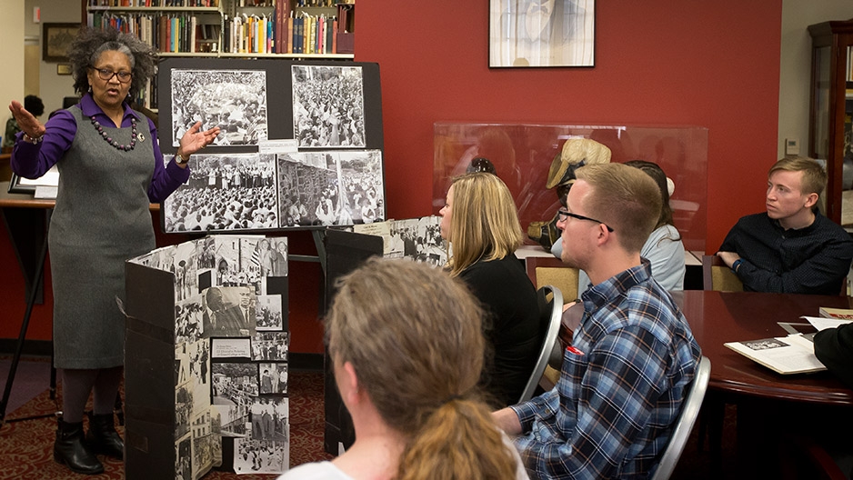 Students listening to a woman from the Cecil B. Moore Freedom Fighters speak. 