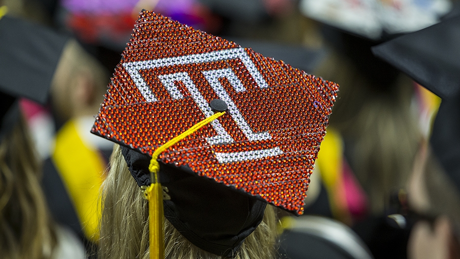 A graduation cap decorated to show the Temple "T."