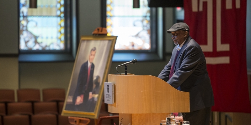 John Chaney speaks at a lectern at a service for Peter J. Liacouras.