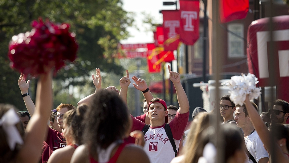 Students gathering on campus for a pep rally