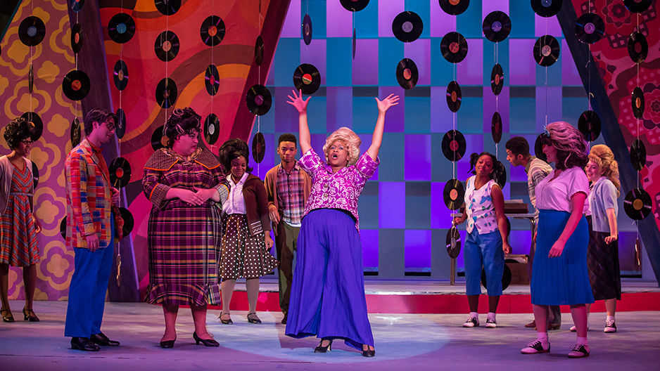 Actors in costume on the set of Temple Theaters's production of Hairspray.