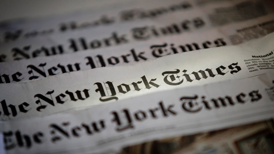 A spread of several New York Times newspapers.
