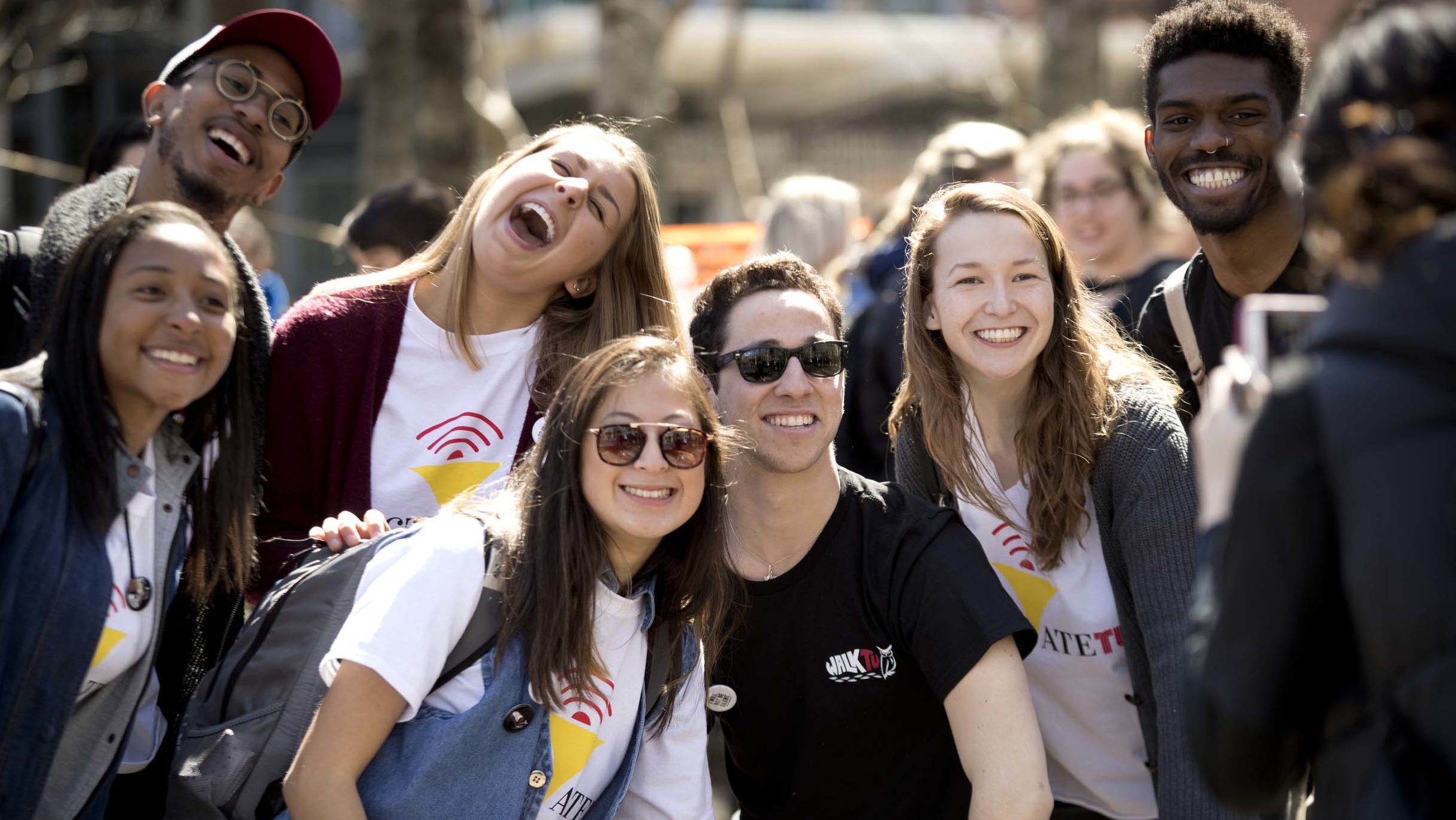 a group of students laughing together