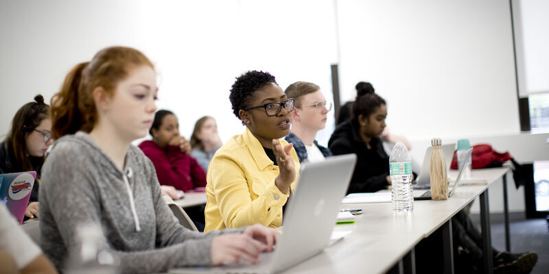 Students using computers in a classroom 