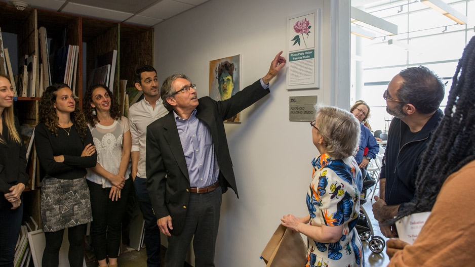 Stuart Holzer unveiling a plaque dedicating a painting studio to his wife