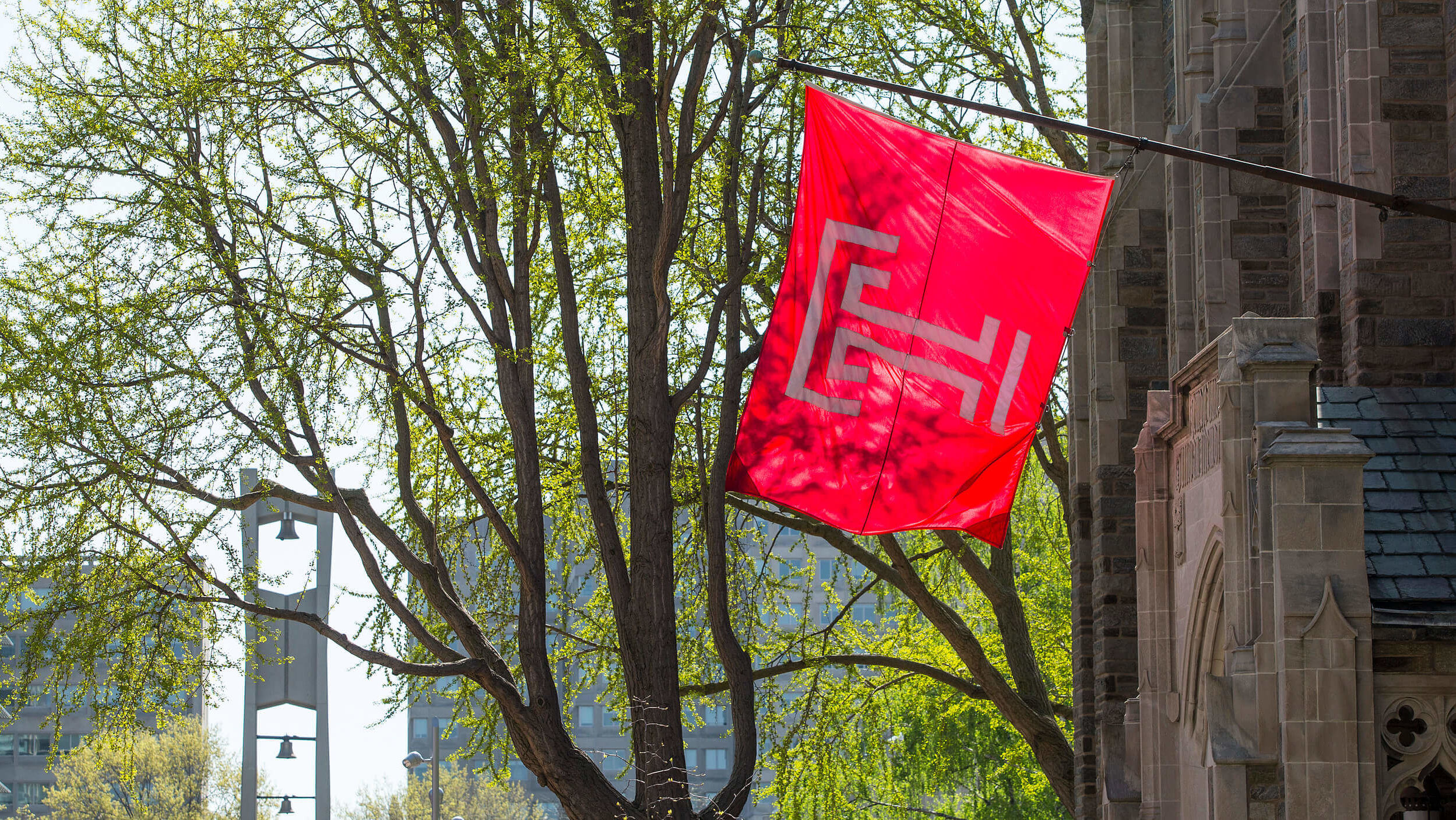 The Temple flag flies outside Sullivan Hall.