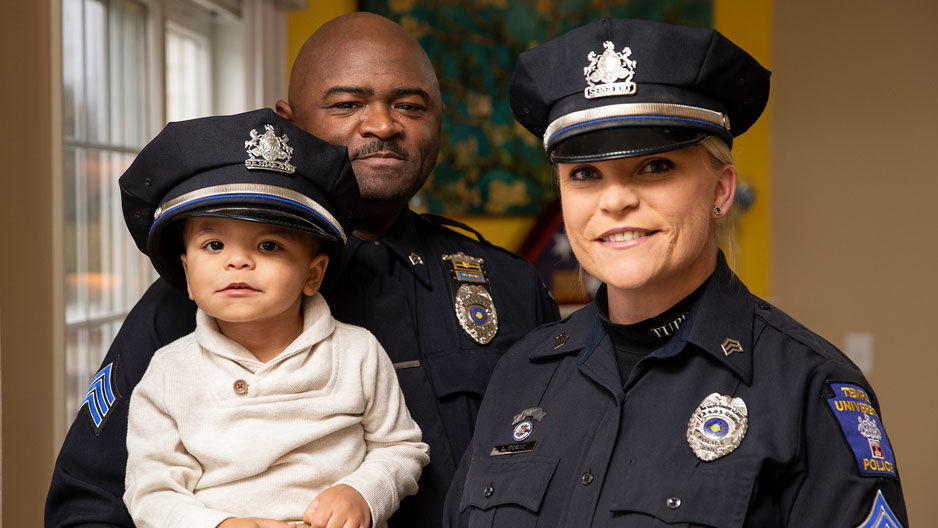 Sergeants Kamari and Lauren Boone with their toddler son