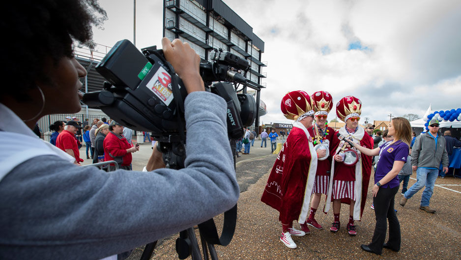 Alison Lorraine reporting at the Independence Bowl