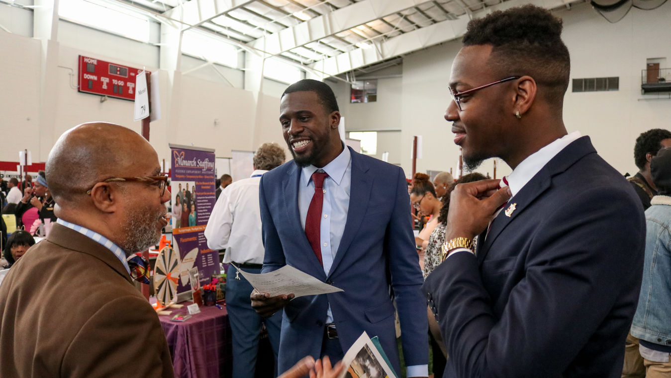 Temple’s Michael Robinson talking to job seekers at the 2019 Annual Job Fair.