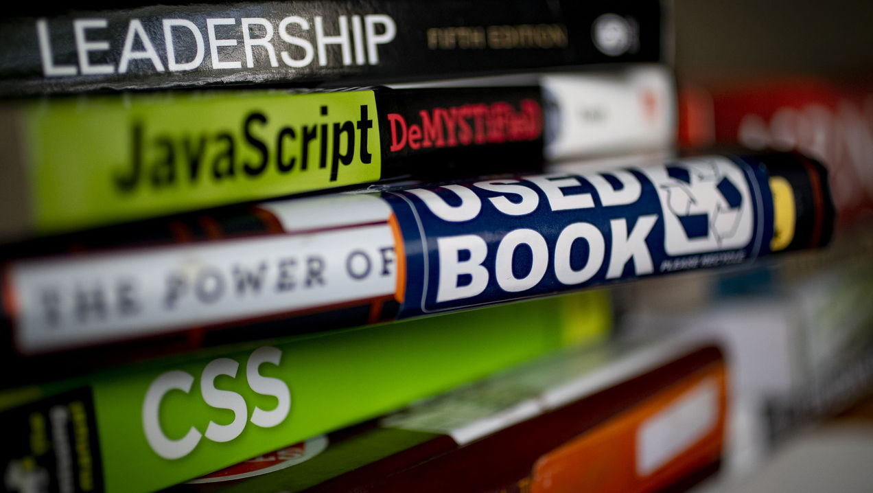 a stack of textbooks