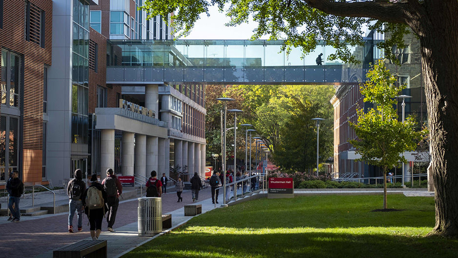 students walking on the Main Campus of Temple University in autumn 