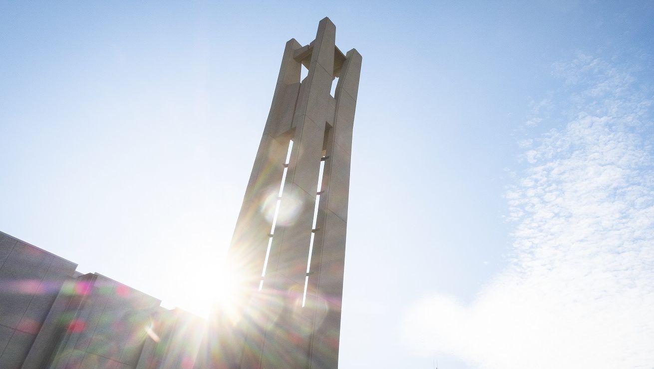A sunbeam shining behind the Bell Tower. 