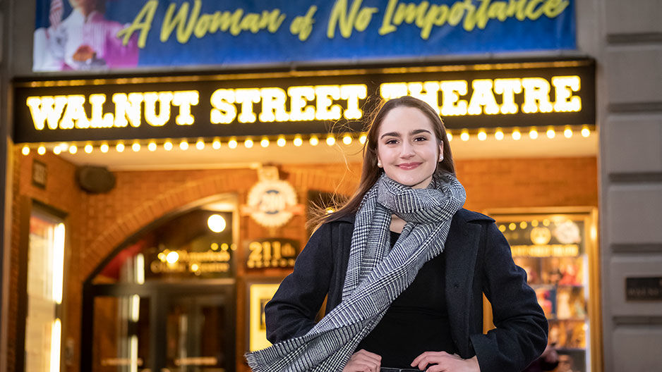 Audrey Ward standing in front of the Walnut Street Theatre in Philadelphia