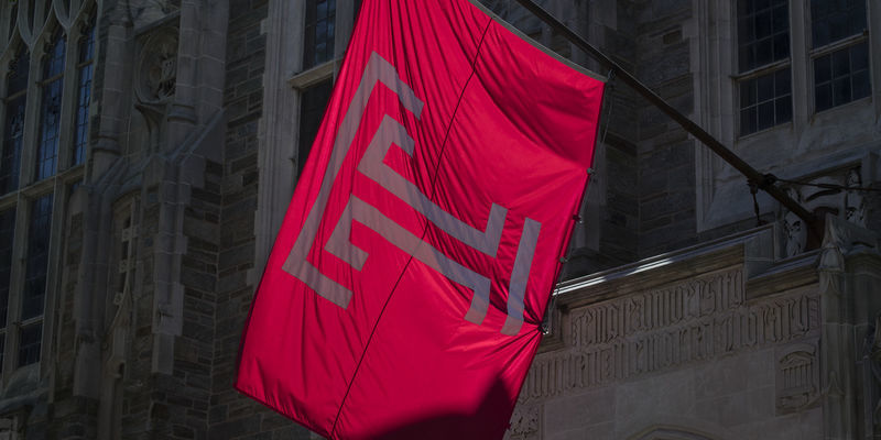 Temple flag flying on campus.