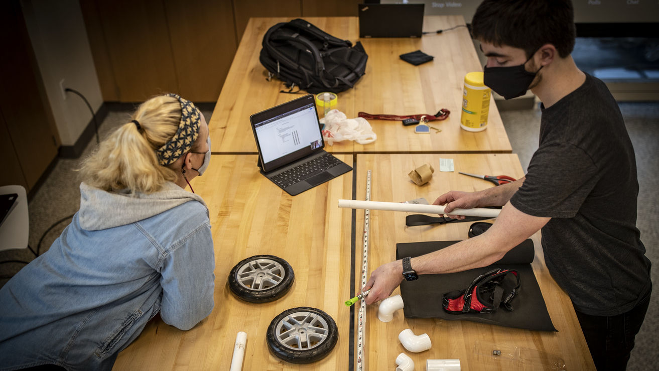 Temple students building prototype for a puppy wheelchair.