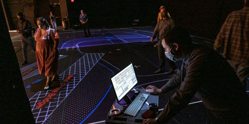 Temple University faculty try out a new projection mapping system.