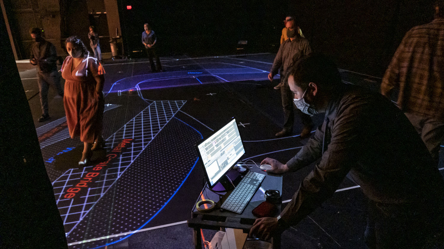 Temple University faculty try out a new projection mapping system.