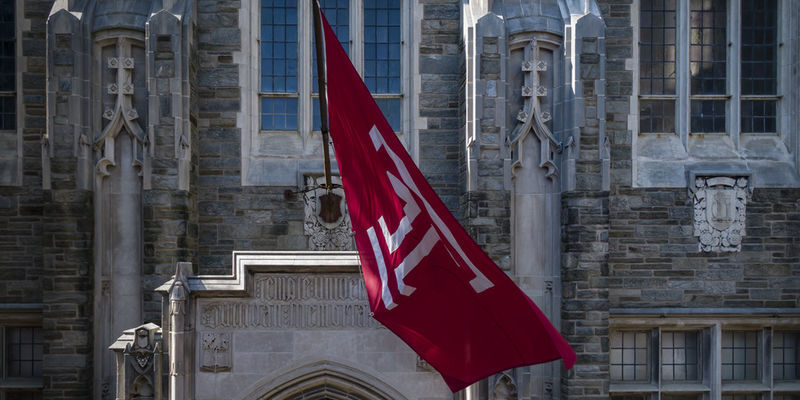 A photo of the Temple flag outside Sullivan Hall.