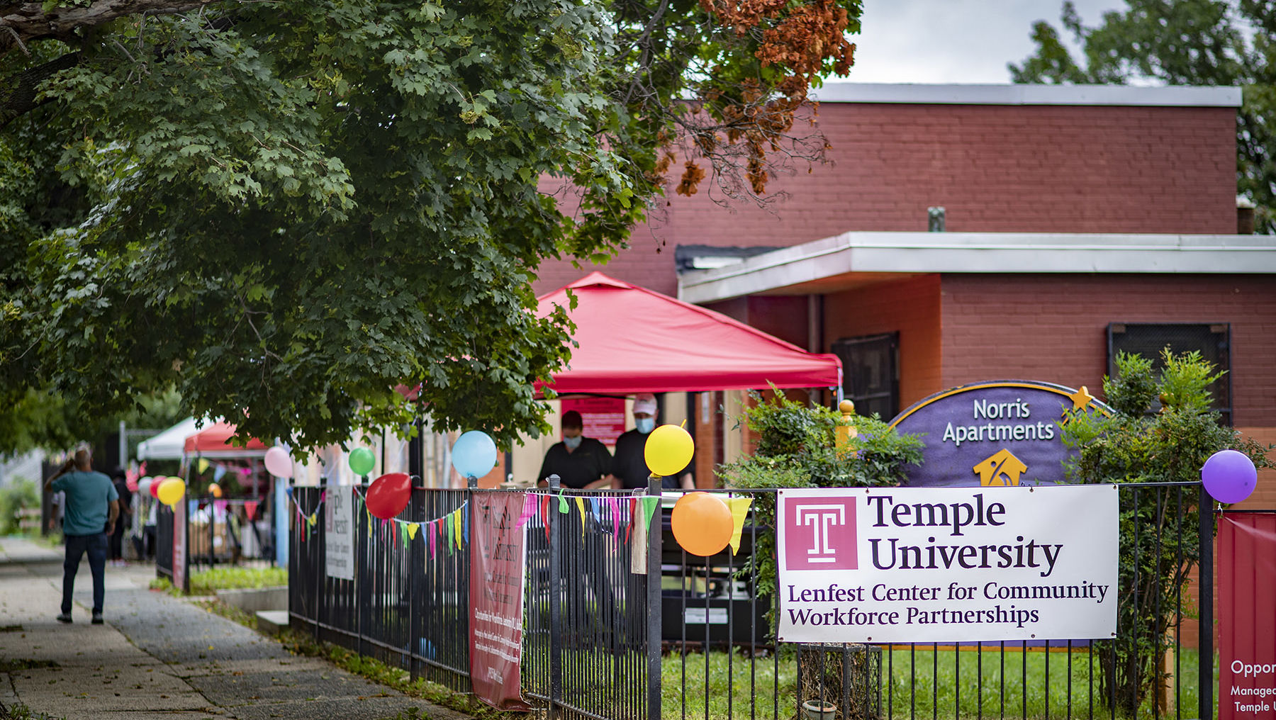 Image of the “Swing into School Circus” event held at the former Norris Homes Community Center in North Philadelphia. 