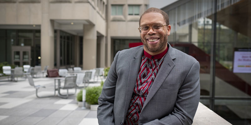 Timothy Welbeck, a professor at Temple University posing outside at the rooftop terrace of Mazur and Gladfelter halls.  