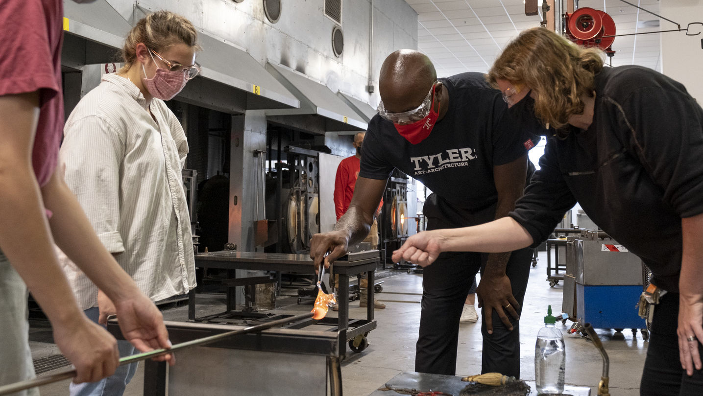 President Wingard in a glassmaking course.