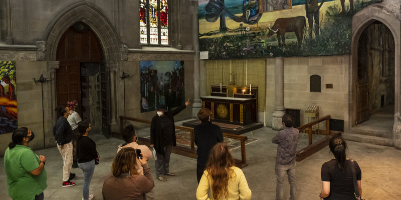 Visitors tour the Church of the Advocate