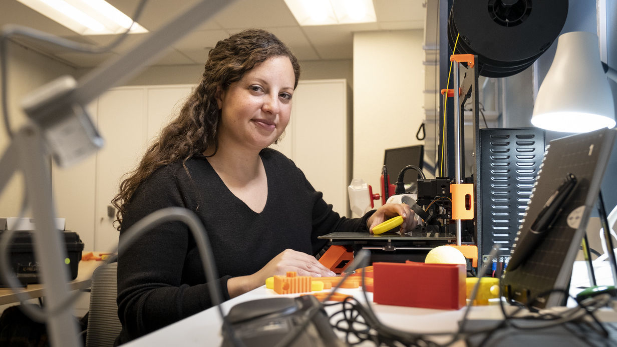 Image of Assistive Technology Specialist Alanna Raffel working in the Ritter Annex lab.