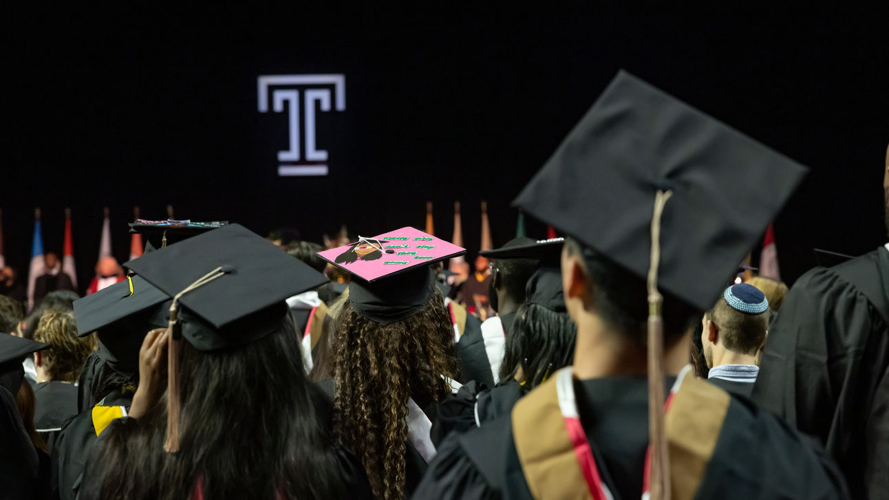 Image of graduates looking towards the stage at Temple’s 135th Commencement.