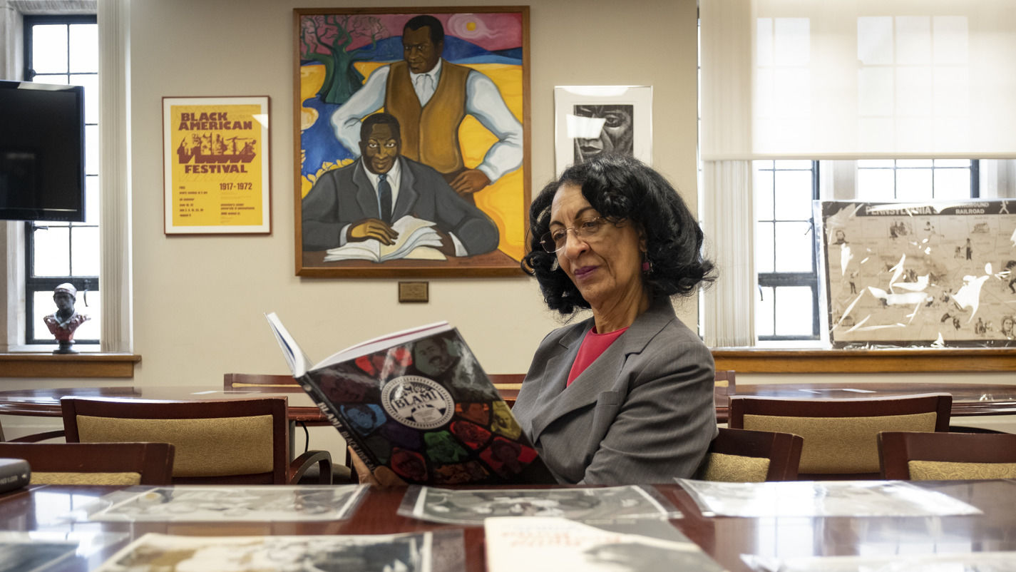 Diane Turner, curator of the Blockson Collection, reads a copy of the collection’s new graphic novel, “Black Lives Always Mattered!”