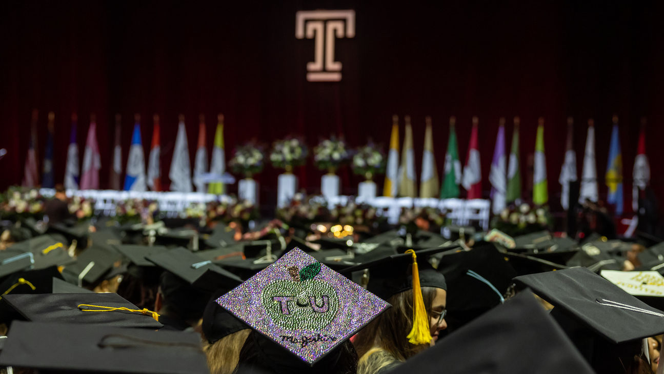 a graduation cap in a crowd of caps