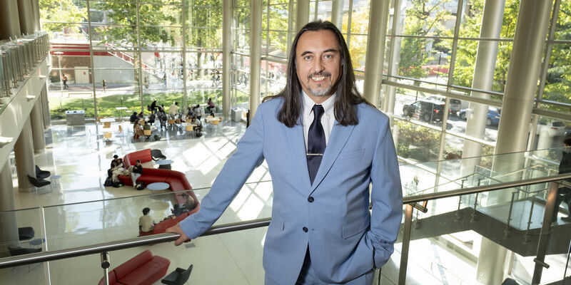 Dean Miguel Mostafá standing near the railing in the Science and Education Research Center