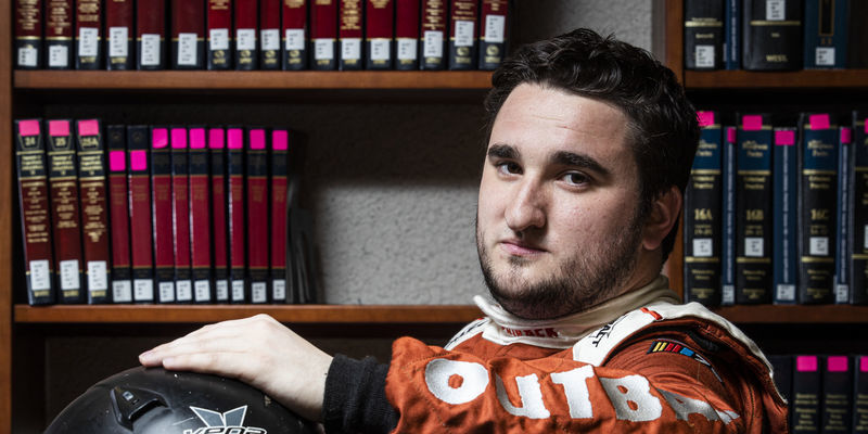 Image of a NASCAR driver inside Temple University’s Law School.