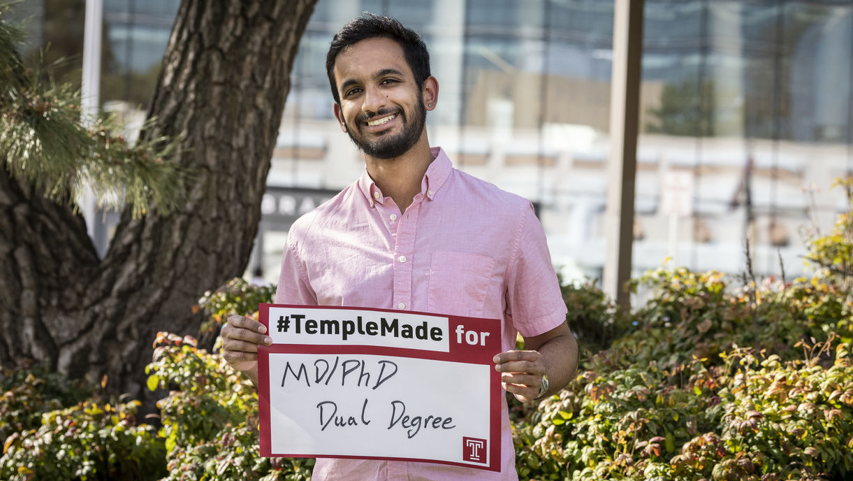 Image of Temple student on Main Campus outside.  