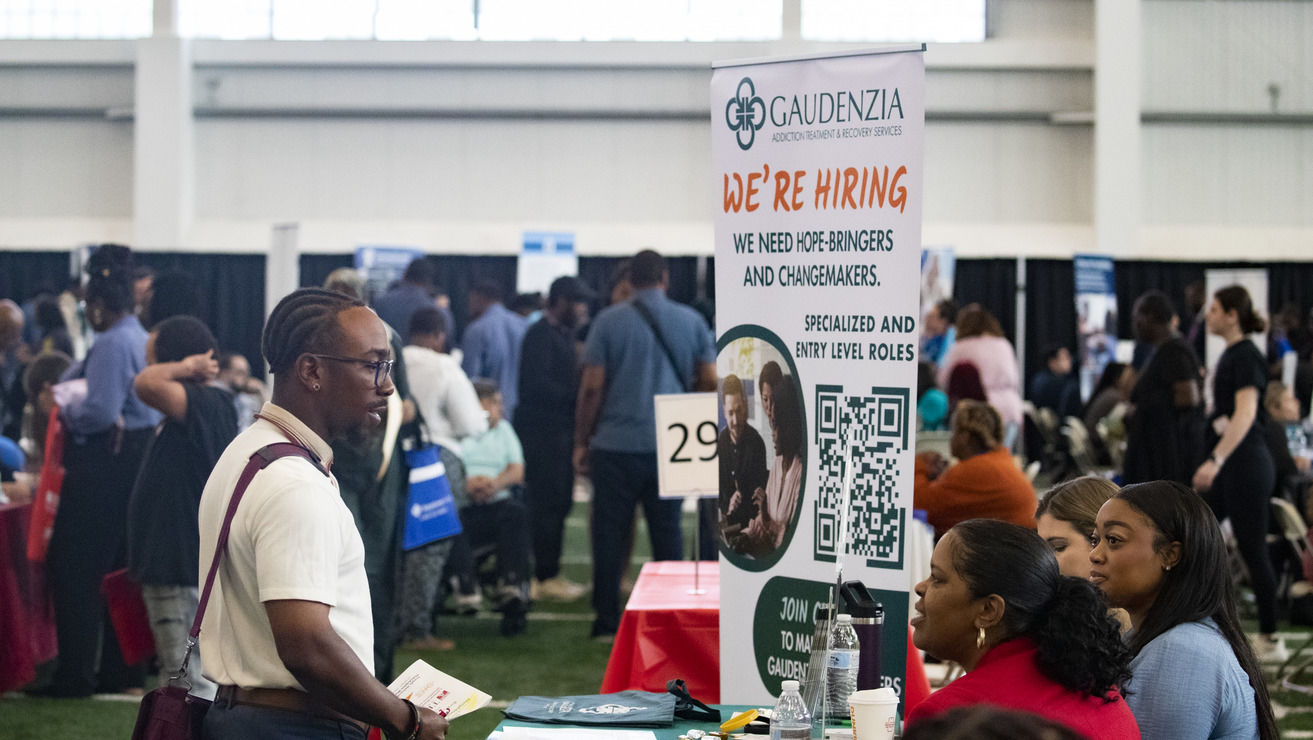 Image of job seekers at Temple University Aramark STAR Complex.  