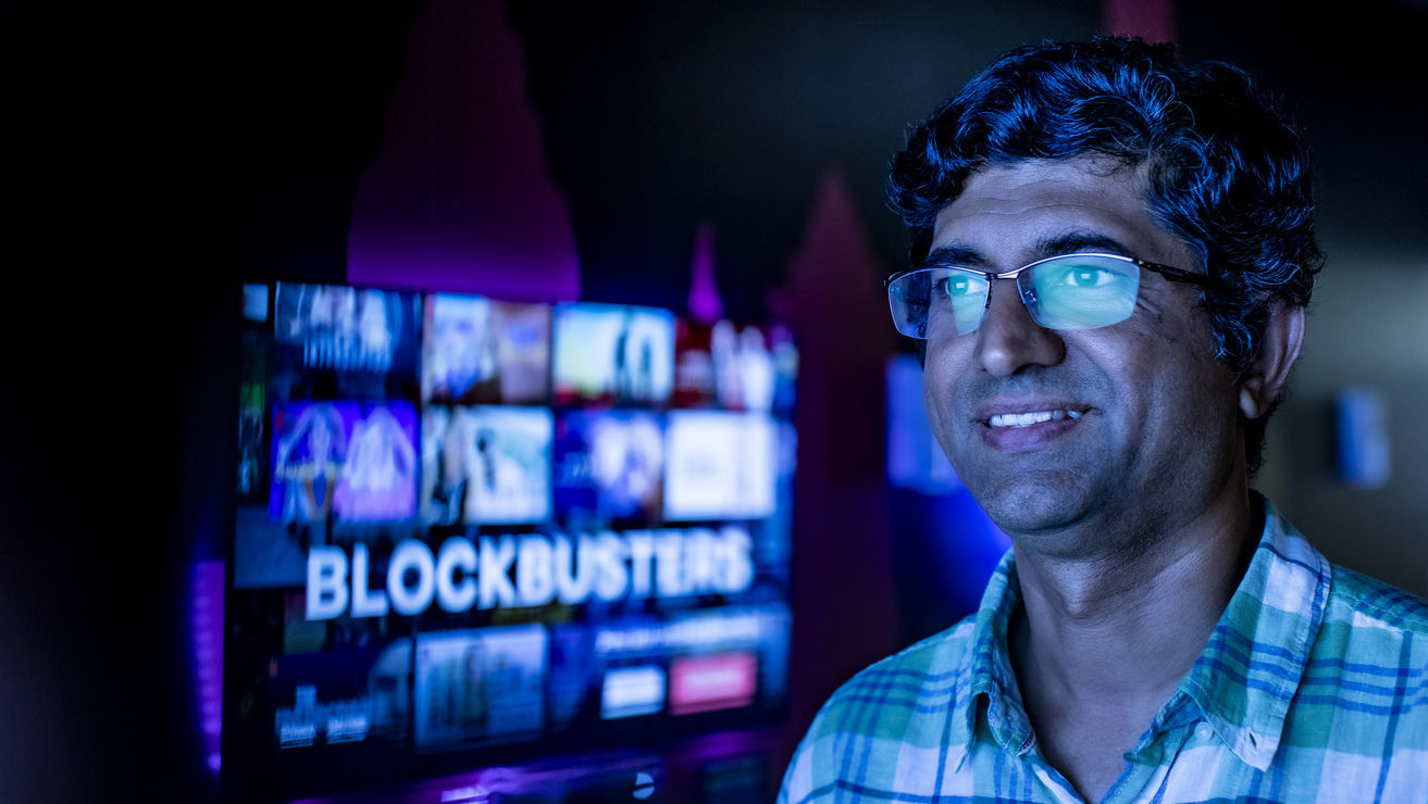 Vinod Venkatraman pictured with a Netflix screen behind him.