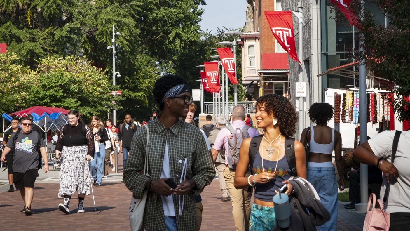 Students walking on campus during the first day of classes.