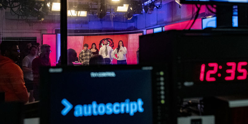 Image of Temple students in the Owl Update studio.