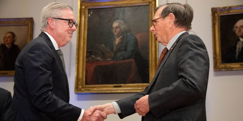 A picture of President John Fry being inducted into the American Philosophical Society.