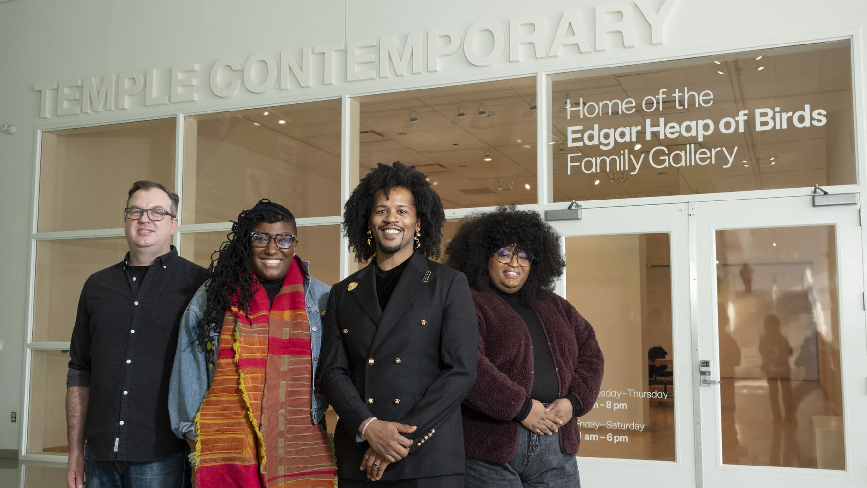 Temple Contemporary leaders stand in front of a gallery