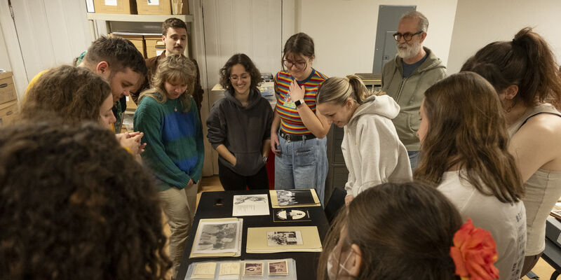 Students looking at archival materials in the William Way LGBT Community Center