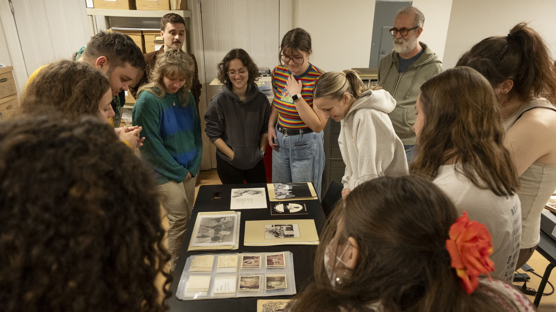 Students looking at archival materials in the William Way LGBT Community Center
