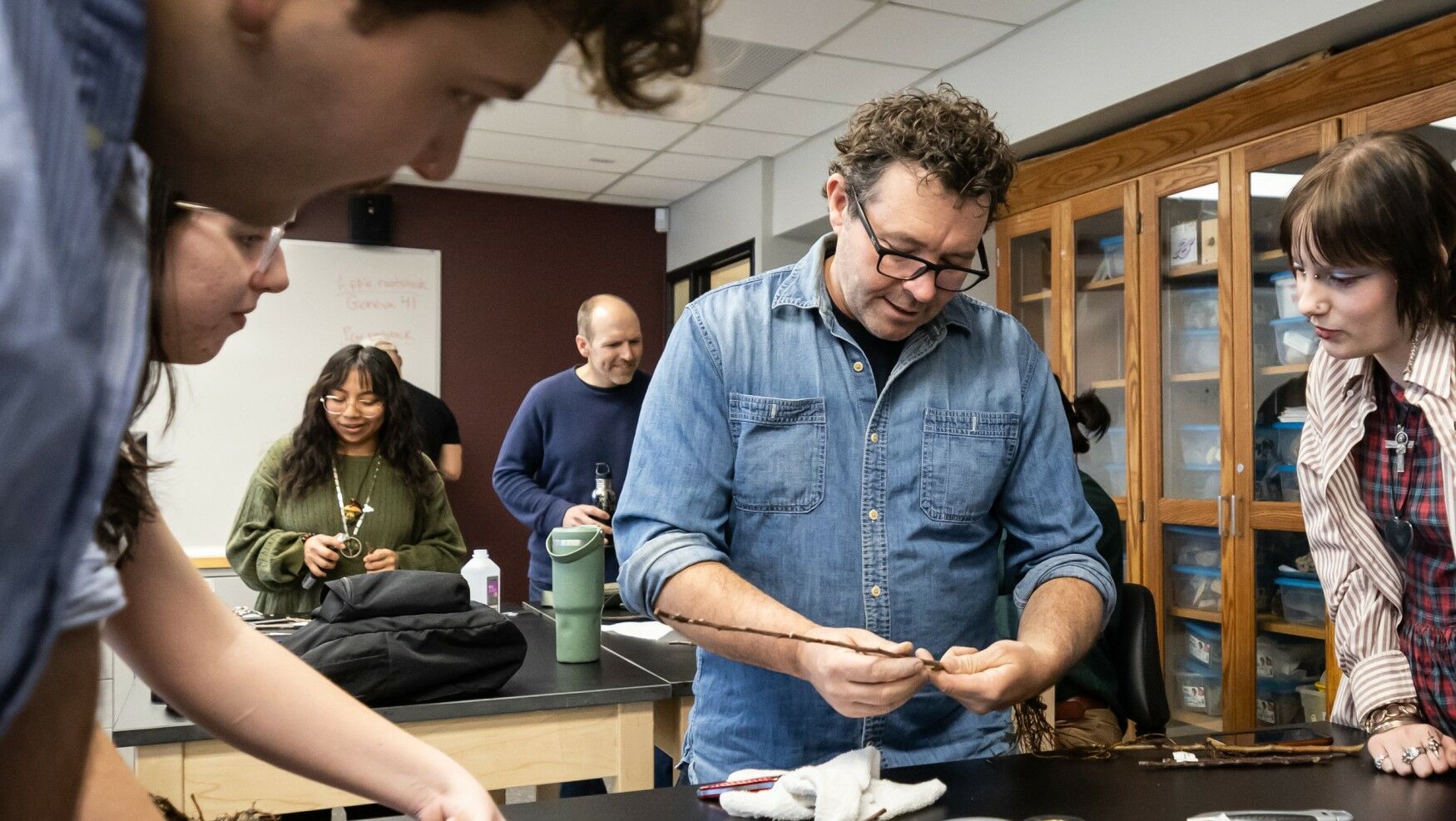 Sam Van Aken working with students