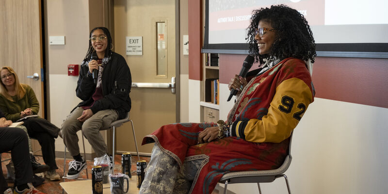 A photo of author Nic Stone speaking on Temple's campus.