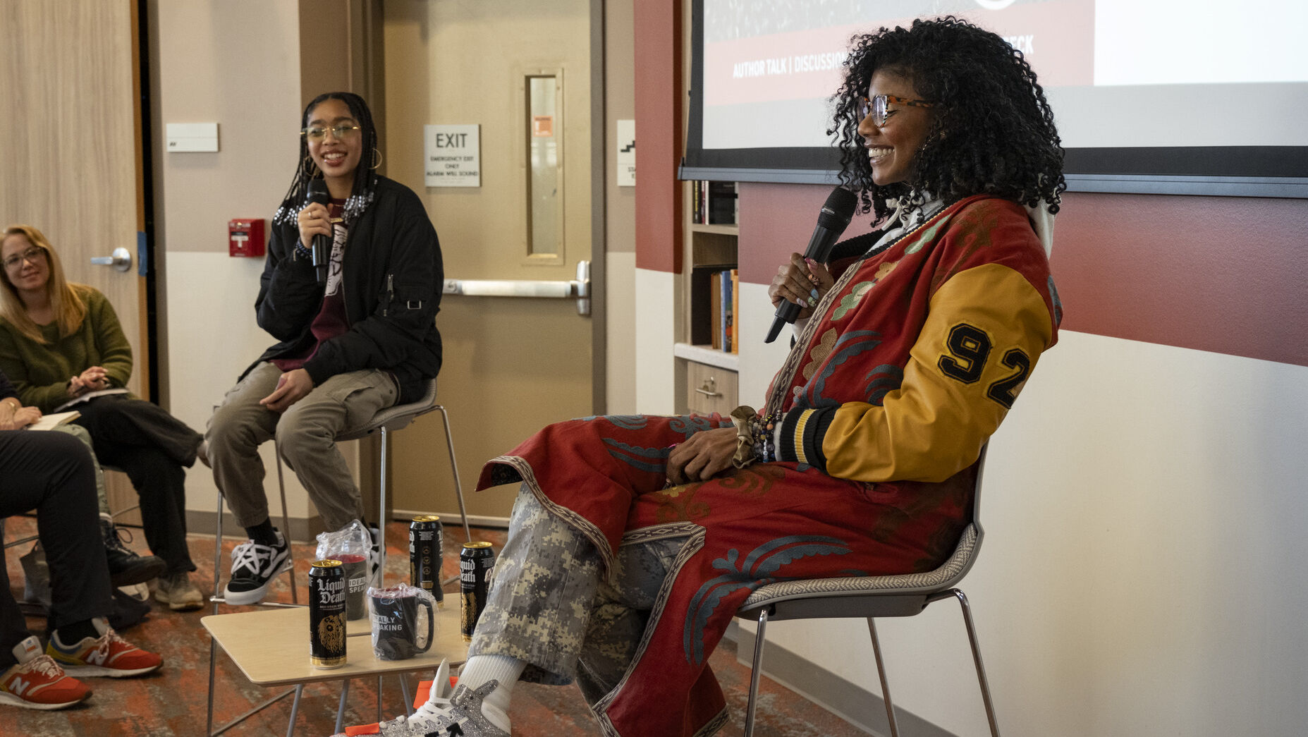A photo of author Nic Stone speaking on Temple's campus.