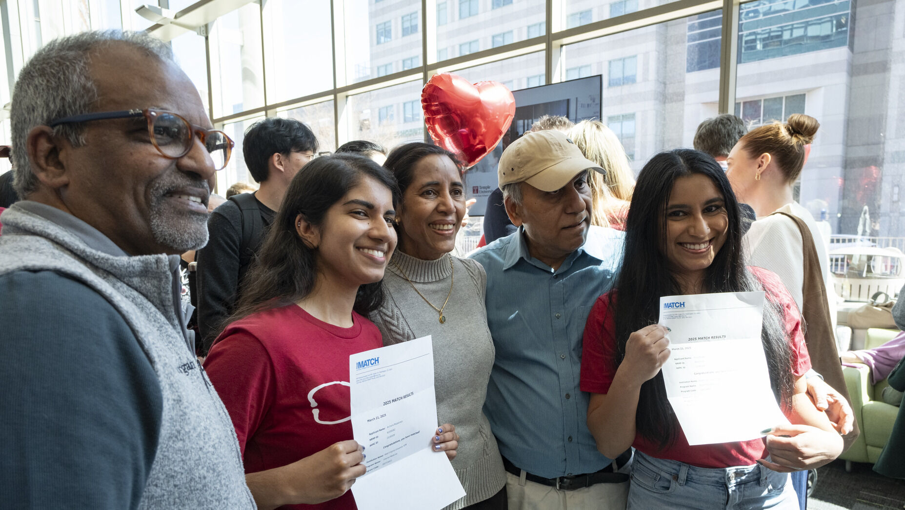 Students and their family celebrating Match Day 2025 at Temple's Lewis Katz School of Medicine.