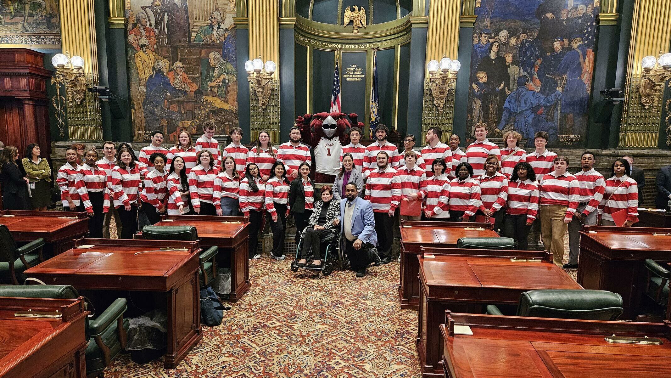 Students, Hooter, Sen. Christine Tartaglione (D-2), Sen. Amanda Cappelletti (D-17), and Sen. Sharif Street (D-3) on the floor of the Senate of Pennsylvania.  
