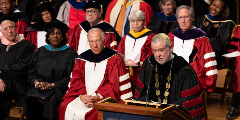 President Fry speaking at podium during Investiture