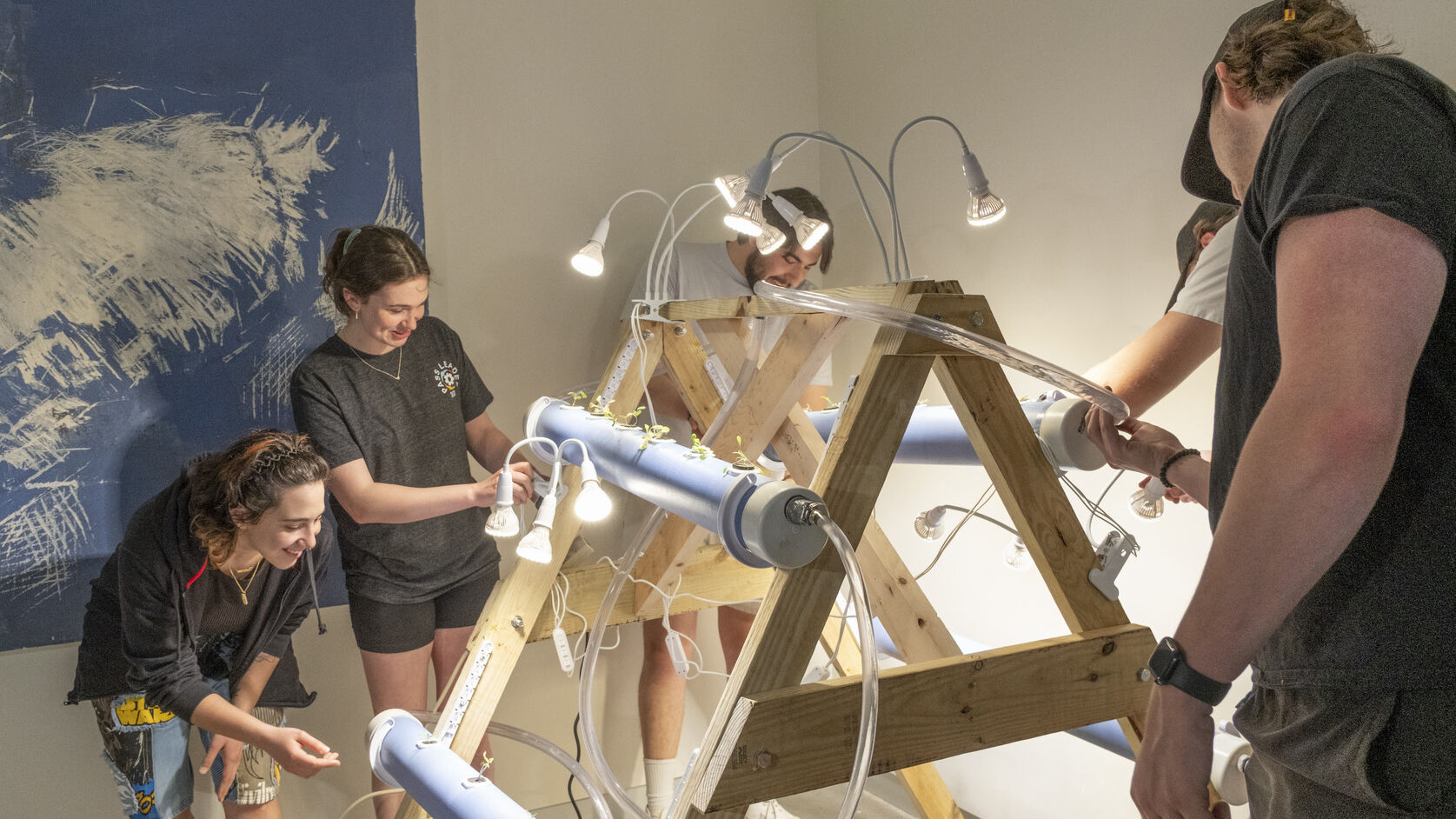 Image of students installing a hydroponic system.